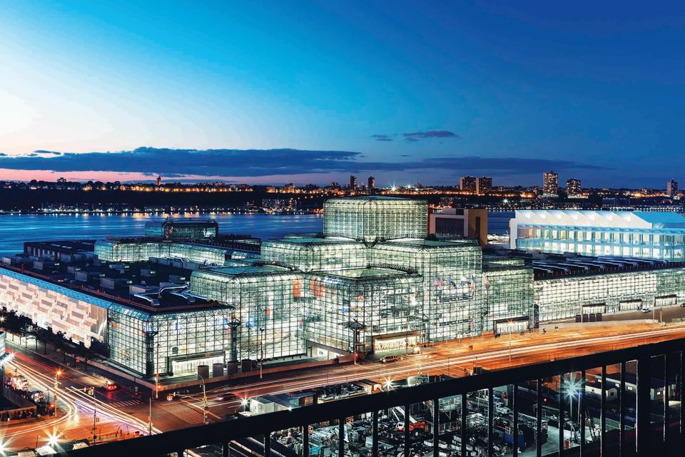 The Javits Center at dusk on the Hudson River, New York City